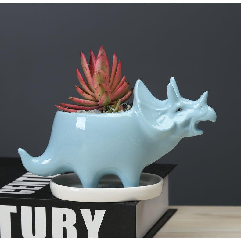 Joli pot de fleurs succulentes en forme de dinosaure avec plateau de drainage