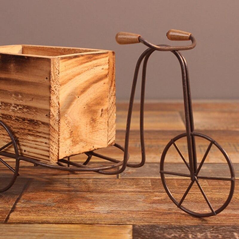 Tricycle de table en fer forgé avec jardinière en bois