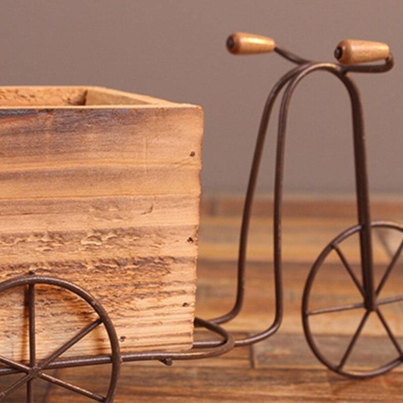 Tricycle de table en fer forgé avec jardinière en bois